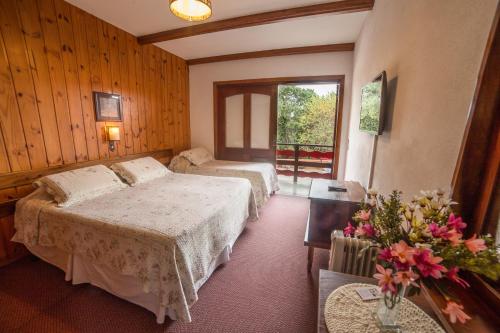 Katil atau katil-katil dalam bilik di Hotel Recanto São Cristóvão - Próximo ao parque Tarundu