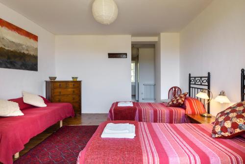 Ένα ή περισσότερα κρεβάτια σε δωμάτιο στο Casa Sarasa
