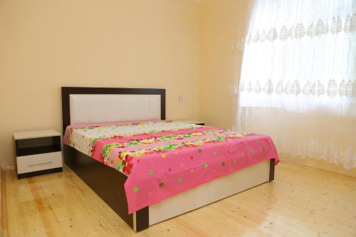Postel nebo postele na pokoji v ubytování Qebele Vendam