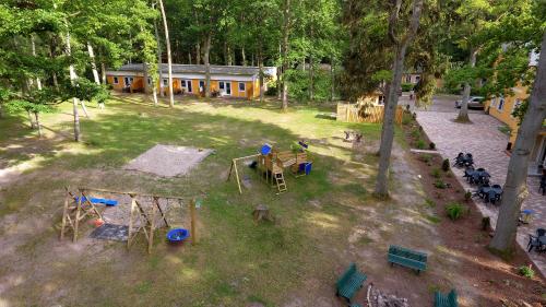 an aerial view of a park with a playground at Bernstein Appartements in Dranske