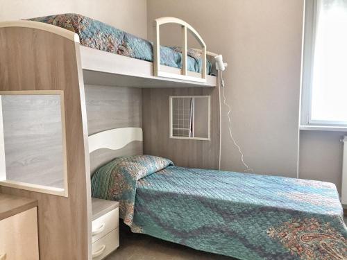 Postel nebo postele na pokoji v ubytování Oleandro 1 apartment in Villa Cerutti