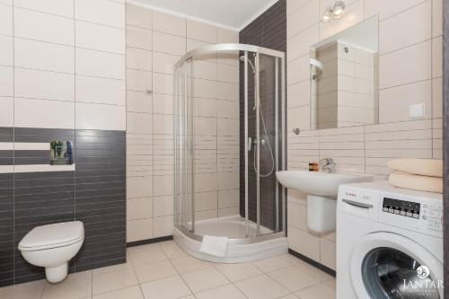 Kúpeľňa v ubytovaní Rezydencja Portowa 14 - Jantar Apartamenty