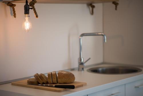 A kitchen or kitchenette at Franko & Ana apartments