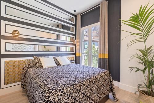 En eller flere senge i et værelse på ChezmoiHomes Trinidad Deluxe 2