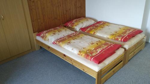 Кровать или кровати в номере Apartman Utvina