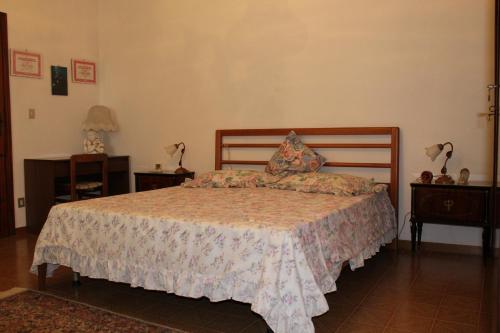 מיטה או מיטות בחדר ב-Tuscany Holiday Home