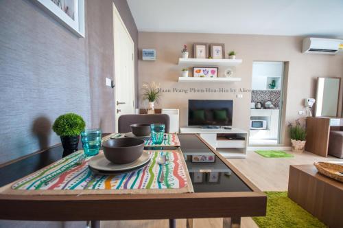 a living room with a table with a bowl on it at Baan Peang Ploen Huahin by Alice in Hua Hin