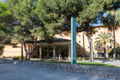 a building with a sign in front of it at Occidental Playa de Palma in Playa de Palma