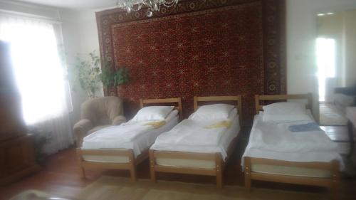 Postel nebo postele na pokoji v ubytování Maka & Khato in Kazbegi