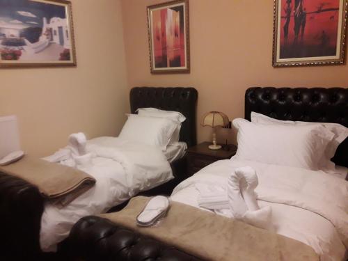 Hotel Vila Manoにあるベッド