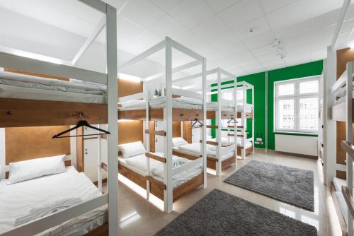 Двухъярусная кровать или двухъярусные кровати в номере Ginger ApartHostel