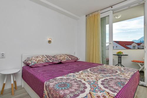 Postel nebo postele na pokoji v ubytování Guesthouse Josko