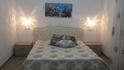 En eller flere senger på et rom på Mediterranea Guest House