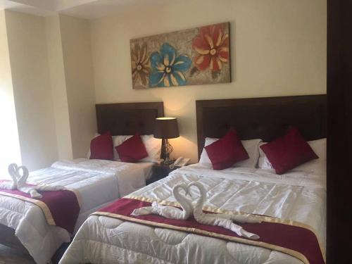Postel nebo postele na pokoji v ubytování Hotel Maefinn