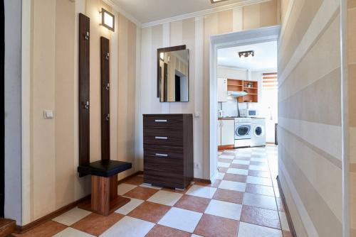 Kylpyhuone majoituspaikassa Home Hotel Apartments on Kontraktova Ploshcha