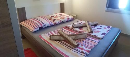 Ένα ή περισσότερα κρεβάτια σε δωμάτιο στο Apartmani B&B