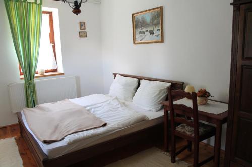 Llit o llits en una habitació de Rábagyarmati Apartman
