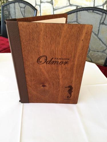 a wooden box sitting on top of a table at Rooms & Pansion Odmor in Rovanjska