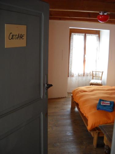 Postel nebo postele na pokoji v ubytování Guesthouse By Wild