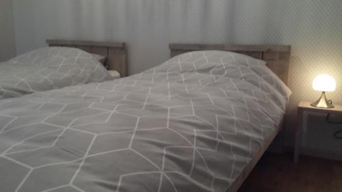 Cama ou camas em um quarto em B&B Siberië