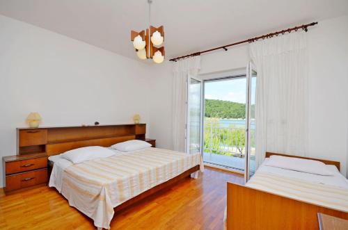 Katil atau katil-katil dalam bilik di Apartments Vila Punta