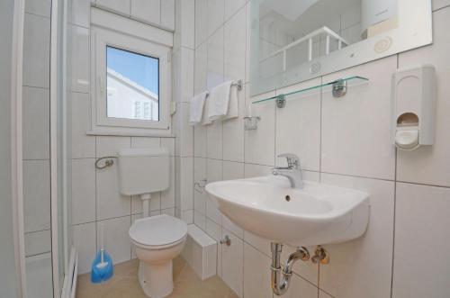 A bathroom at Apartments Marija