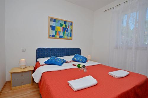 Katil atau katil-katil dalam bilik di Apartments Danica