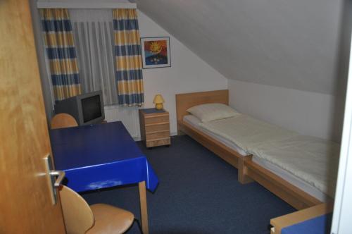 Кровать или кровати в номере Haus Waldblick