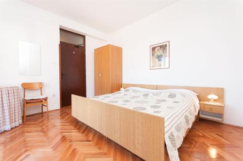 Katil atau katil-katil dalam bilik di Apartments Mate