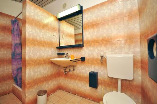 Koupelna v ubytování Apartments Marin