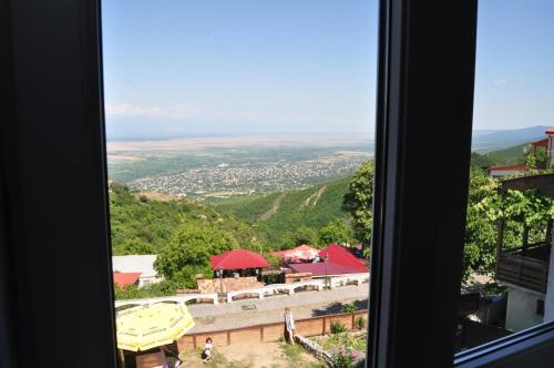 a view of a city from a window at Apartment Chavchavadze 5 in Sighnaghi
