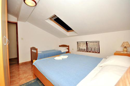 Ένα ή περισσότερα κρεβάτια σε δωμάτιο στο Apartments Andelo