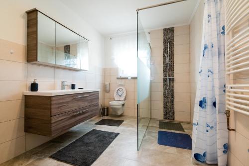 Kylpyhuone majoituspaikassa Ferienhaus Bucic