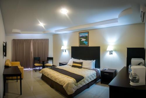 מיטה או מיטות בחדר ב-Hotel y Restaurante El Guarco