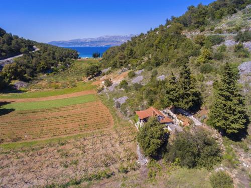 an aerial view of a farm house on a hill at House Silvana in Postira
