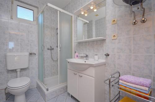 Koupelna v ubytování Apartments Sweet Escape