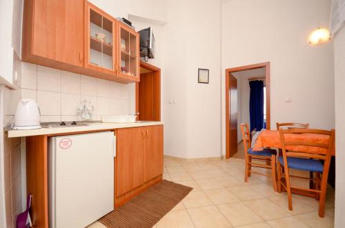 Kuchyň nebo kuchyňský kout v ubytování Apartments Silvana