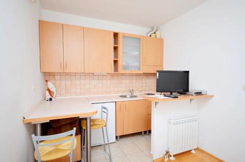 Virtuvė arba virtuvėlė apgyvendinimo įstaigoje Apartment Marijo