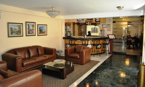 The lobby or reception area at Embajadores Hotel