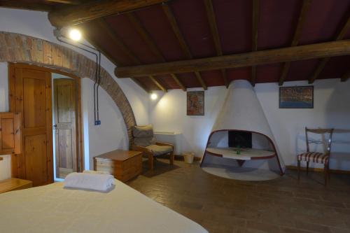 Postel nebo postele na pokoji v ubytování Agriturismo Borgo Del Papa
