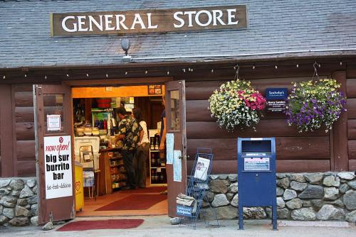 a store with a sign that reads general store at Big Sur River Inn in Big Sur
