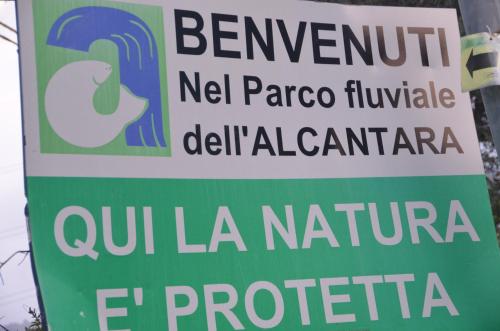 a sign for a zoo with a bird on it at Gole Dell'Alcantara Villa Lucia in Motta Camastra