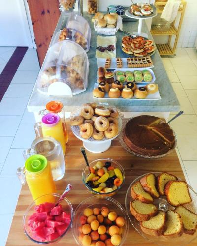 a table with a bunch of different types of food at Casa Lucia in Sorrento