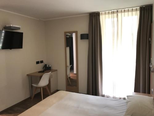 Μια τηλεόραση ή/και κέντρο ψυχαγωγίας στο Hotel Le Cime