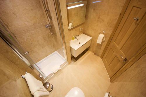 Koupelna v ubytování Edgerton Hotel
