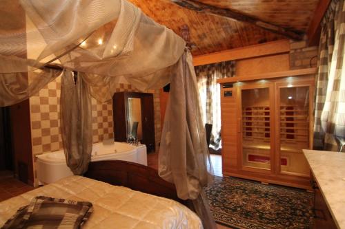 Postel nebo postele na pokoji v ubytování Hotel Il Feudo Dei Pierleoni