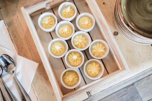 a tray of deviled eggs on a table at Hinds Head in Aldermaston