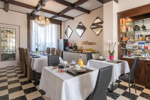 Restoranas ar kita vieta pavalgyti apgyvendinimo įstaigoje Appart'hôtel et chambres Lens