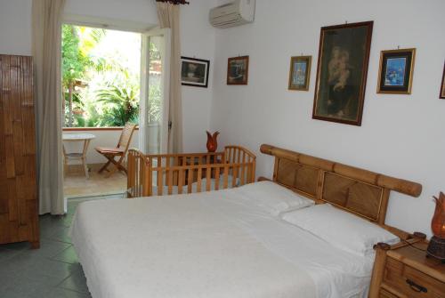 Säng eller sängar i ett rum på Residence Villa Cristina