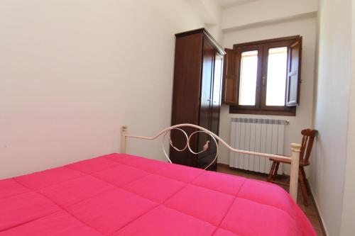 Postel nebo postele na pokoji v ubytování Hotel Il Feudo Dei Pierleoni